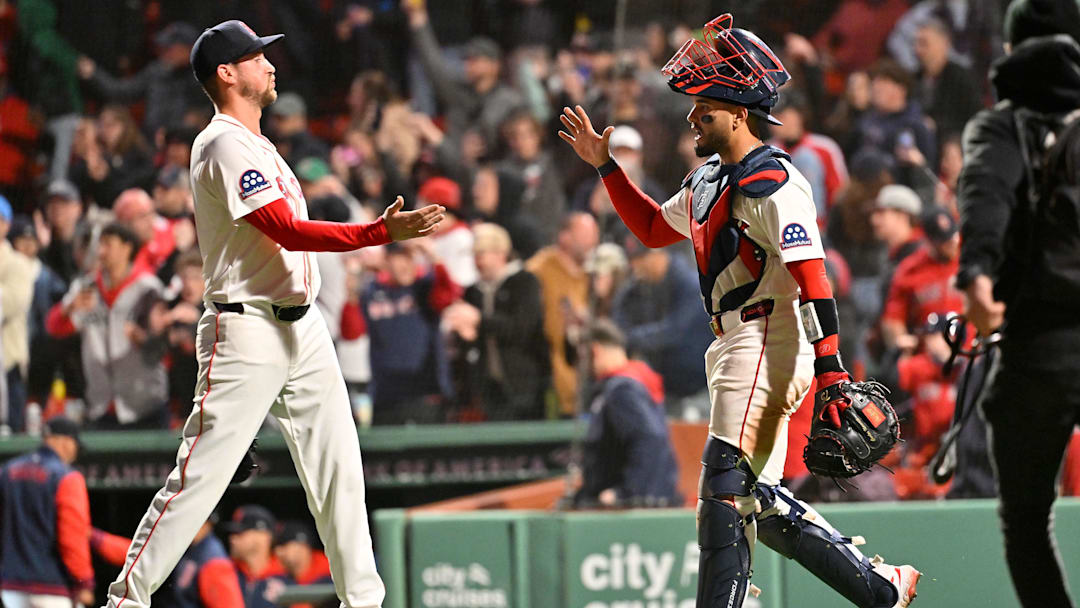 Apr 6, 2025; Boston, Massachusetts, USA; Boston Red Sox catcher Carlos Narvaez (75) and relief pitcher Cooper Criswell (64) celebrate defeating the St. Louis Cardinals at Fenway Park. Mandatory Credit: Eric Canha-Imagn Images Apr 6, 2025; Boston, Massachusetts, USA; Boston Red Sox catcher Carlos Narvaez (75) and relief pitcher Cooper Criswell (64) celebrate defeating the St. Louis Cardinals at Fenway Park. Mandatory Credit: Eric Canha-Imagn Images