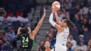 Las Vegas Aces center A'ja Wilson shoots against Minnesota Lynx forward Napheesa Collier.