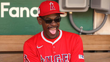 Jul 21, 2024; Oakland, California, USA; Los Angeles Angels manager Ron Washington (37) laughs in the dugout before the game against the Oakland Athletics at Oakland-Alameda County Coliseum. Mandatory Credit: Darren Yamashita-USA TODAY Sports