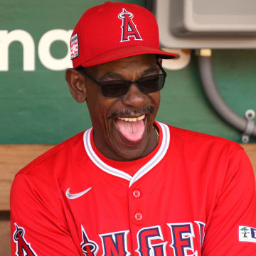 Jul 21, 2024; Oakland, California, USA; Los Angeles Angels manager Ron Washington (37) laughs in the dugout before the game against the Oakland Athletics at Oakland-Alameda County Coliseum. Mandatory Credit: Darren Yamashita-USA TODAY Sports