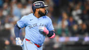 Oct 15, 2025; Seattle, Washington, USA; Toronto Blue Jays first baseman Vladimir Guerrero Jr. (27) runs after hitting a solo home run during the fifth inning against the Seattle Mariners during game three of the ALCS round for the 2025 MLB playoffs at T-Mobile Park. 