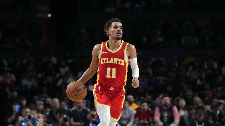 Nov 9, 2023; Mexico City, MEX; Atlanta Hawks guard Trae Young (11) dribbles against the Orlando Magic in the second half during the 2023 NBA Mexico City Game at the Arena CDMX. Mandatory Credit: Kirby Lee-USA TODAY Sports