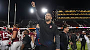 Sep 13, 2025; Stanford, California, USA; Stanford Cardinal general manager Andrew Luck (center) celebrates after defeating the Boston College Eagles at Stanford Stadium. Mandatory Credit: Darren Yamashita-Imagn Images