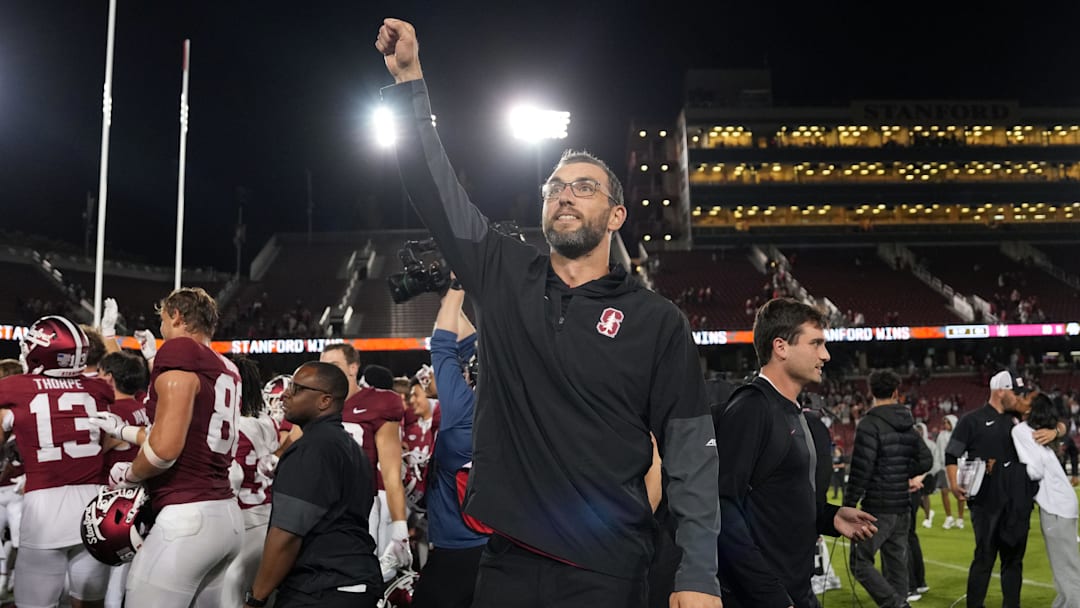 Sep 13, 2025; Stanford, California, USA; Stanford Cardinal general manager Andrew Luck (center) celebrates after defeating the Boston College Eagles at Stanford Stadium. Mandatory Credit: Darren Yamashita-Imagn Images