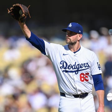 Jul 21, 2024; Los Angeles, California, USA; Los Angeles Dodgers pitcher James Paxton (65) at the mount against the Boston Red Sox during the first inning at Dodger Stadium.