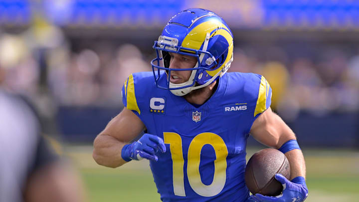 Oct 15, 2023; Inglewood, California, USA; Los Angeles Rams wide receiver Cooper Kupp (10) runs after a catch against the Arizona Cardinals during the first half at SoFi Stadium. Mandatory Credit: Alex Gallardo-Imagn Images
