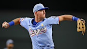 Texas Rangers third baseman Josh Jung (6) throws out Houston Astros catcher Yainer Diaz (not pictured) during the second inning at Globe Life Field.