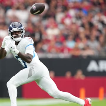 Oct 5, 2025; Glendale, Arizona, USA; Tennessee Titans wide receiver Calvin Ridley (0) makes a catch against the Arizona Cardinals during the second quarter at State Farm Stadium. Mandatory Credit: Joe Camporeale-Imagn Images