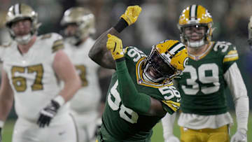 Green Bay Packers linebacker Edgerrin Cooper (56) celebrates a tackle for a three-yard loss during the second quarter of their game Monday, December 23, 2024 at Lambeau Field in Green Bay, Wisconsin. The Green Bay Packers beat the New Orleans Saints 34-0.