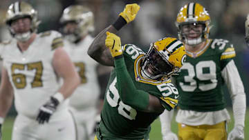 Green Bay Packers linebacker Edgerrin Cooper (56) celebrates a tackle for a three-yard loss during the second quarter of their game Monday, December 23, 2024 at Lambeau Field in Green Bay, Wisconsin. The Green Bay Packers beat the New Orleans Saints 34-0.