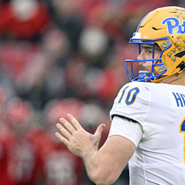 Nov 23, 2024; Louisville, Kentucky, USA;  Pittsburgh Panthers quarterback Eli Holstein (10) throws against the Louisville Cardinals during the first quarter at L&N Federal Credit Union Stadium. Mandatory Credit: Jamie Rhodes-Imagn Images