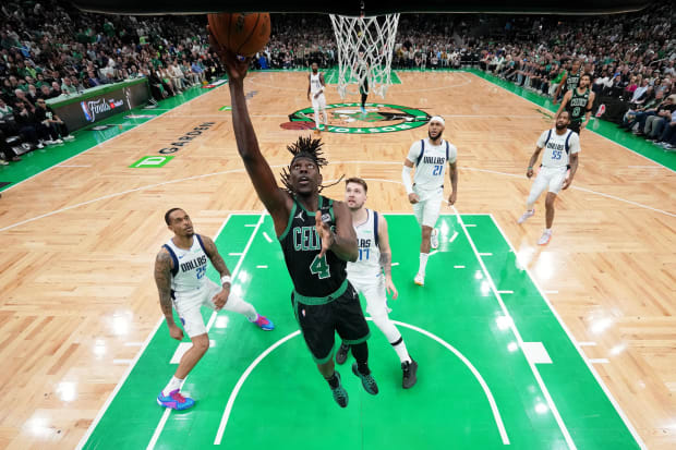 Boston Celtics guard Jrue Holiday lays the ball in during Game 2 of the 2024 NBA Finals vs. the Dallas Mavericks.