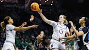 Notre Dame forward Kate Koval (13) goes after a loose ball during the first round of the NCAA Women's Basketball Tournament between Notre Dame and Stephen F. Austin at Purcell Pavilion on Friday, March 21, 2025, in South Bend.