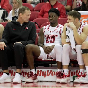Associate head coach Joe Krabbenhoft talks with John Blackwell (32) during a Wisconsin men’s basketball scrimmage Sunday, October 19, 2025 at the Kohl Center in Madison, Wisconsin.