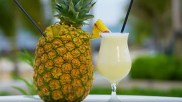 Original Pina Colada with a Pineapple Cup at Caribe Hilton 