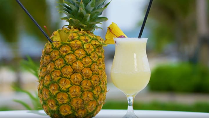 Original Pina Colada with a Pineapple Cup at Caribe Hilton 