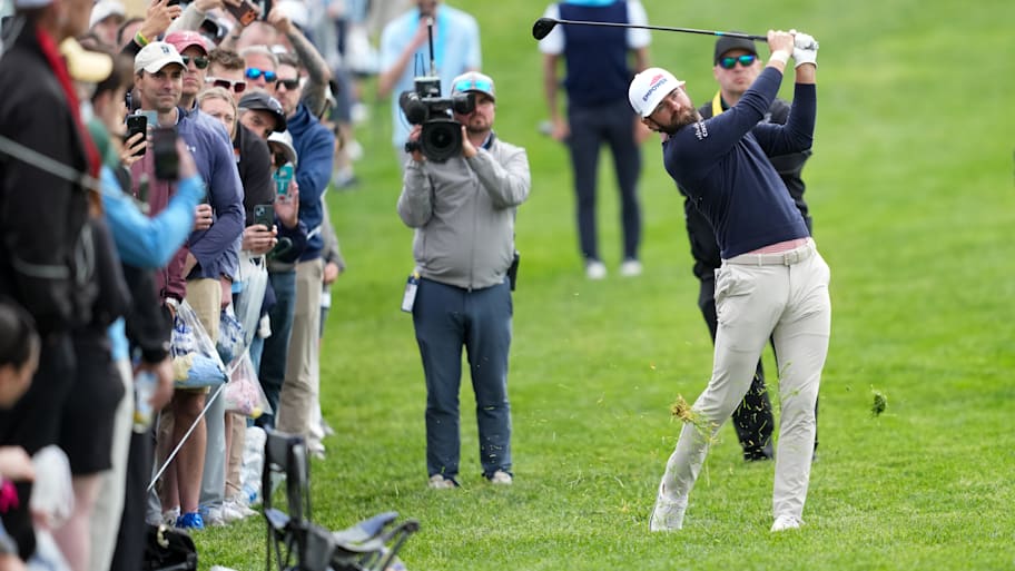 Cameron Young plays his shot on the ninth hole during the first round of the PGA Championship