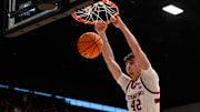 Feb 8, 2025; Stanford, California, USA; Stanford Cardinal forward Maxime Raynaud (42) dunks against the NC State Wolfpack in the second half at Maples Pavilion. Mandatory Credit: Eakin Howard-Imagn Images