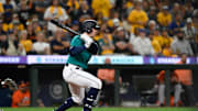 Seattle Mariners left fielder Cade Marlowe (18) hits a single against the Baltimore Orioles during the ninth inning at T-Mobile Park in 2023. 