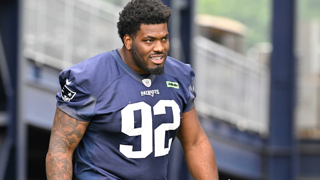 Jun 9, 2025; Foxborough, MA, USA; New England Patriots defensive tackle Joshua Farmer (92) walks to the practice fields at Gillette Stadium. Mandatory Credit: Eric Canha-Imagn Images