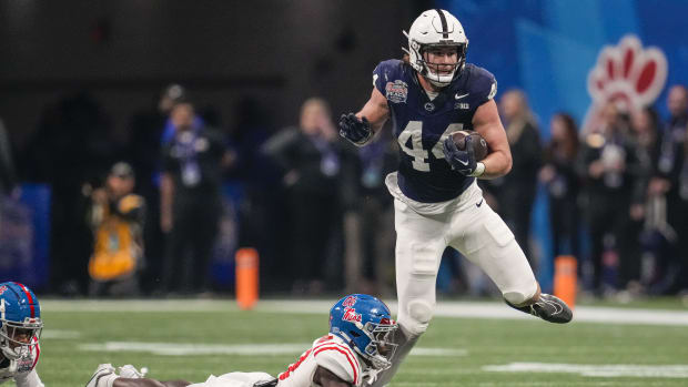 Penn State tight end Tyler Warren runs after a catch against Ole Miss in the 2023 Peach Bowl.