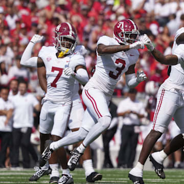 Sep 14, 2024; Madison, Wisconsin, USA;  Alabama Crimson Tide defensive back Malachi Moore (13) celebrates following a Wisconsin Badgers fumble during the second quarter at Camp Randall Stadium. Mandatory Credit: Jeff Hanisch-Imagn Images