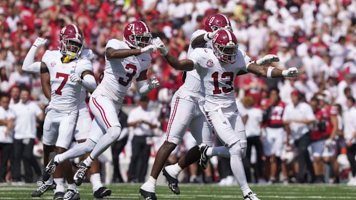 Sep 14, 2024; Madison, Wisconsin, USA;  Alabama Crimson Tide defensive back Malachi Moore (13) celebrates following a Wisconsin Badgers fumble during the second quarter at Camp Randall Stadium. Mandatory Credit: Jeff Hanisch-Imagn Images