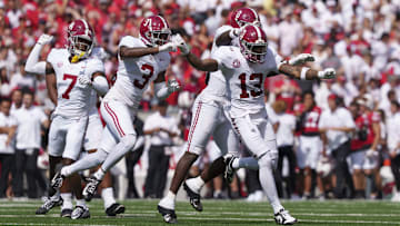 Sep 14, 2024; Madison, Wisconsin, USA;  Alabama Crimson Tide defensive back Malachi Moore (13) celebrates following a Wisconsin Badgers fumble during the second quarter at Camp Randall Stadium. Mandatory Credit: Jeff Hanisch-Imagn Images