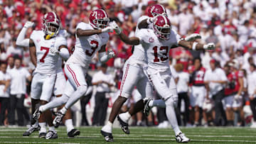 Sep 14, 2024; Madison, Wisconsin, USA;  Alabama Crimson Tide defensive back Malachi Moore (13) celebrates following a Wisconsin Badgers fumble during the second quarter at Camp Randall Stadium. Mandatory Credit: Jeff Hanisch-Imagn Images