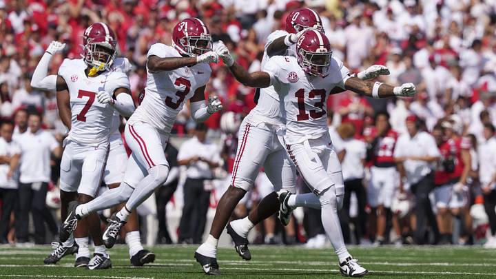 Sep 14, 2024; Madison, Wisconsin, USA;  Alabama Crimson Tide defensive back Malachi Moore (13) celebrates following a Wisconsin Badgers fumble during the second quarter at Camp Randall Stadium. Mandatory Credit: Jeff Hanisch-Imagn Images
