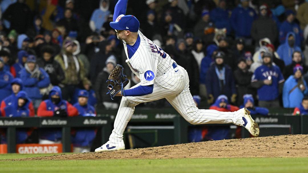 Apr 8, 2025; Chicago, Illinois, USA;  Chicago Cubs pitcher Ryan Pressly (55) delivers during the ninth inning  against the Texas Rangers Wrigley Field. Mandatory Credit: Matt Marton-Imagn Images