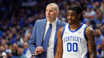 Feb 8, 2025; Lexington, Kentucky, USA; Kentucky Wildcats head coach Mark Pope talks with guard Otega Oweh (00) during the second half against the South Carolina Gamecocks at Rupp Arena at Central Bank Center. Mandatory Credit: Jordan Prather-Imagn Images
