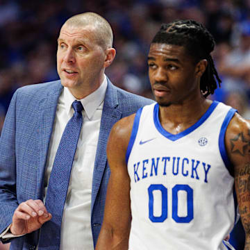 Feb 8, 2025; Lexington, Kentucky, USA; Kentucky Wildcats head coach Mark Pope talks with guard Otega Oweh (00) during the second half against the South Carolina Gamecocks at Rupp Arena at Central Bank Center. Mandatory Credit: Jordan Prather-Imagn Images
