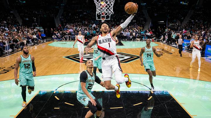 Jan 24, 2025; Charlotte, North Carolina, USA; Portland Trail Blazers guard Anfernee Simons (1) attempts a dunk during the fourth quarter at Spectrum Center. Mandatory Credit: Scott Kinser-Imagn Images