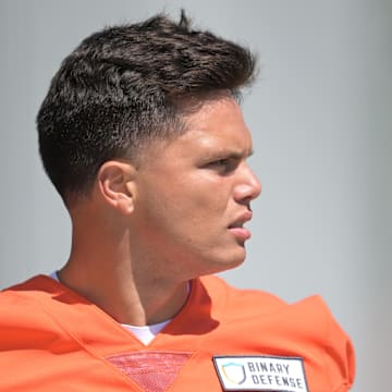 May 9, 2025; Berea, OH, USA; Cleveland Browns quarterback Dillon Gabriel (5) walks off the field after rookie minicamp at CrossCountry Mortgage Campus. 