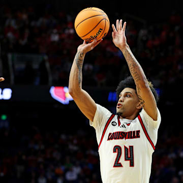 Mar 20, 2025; Lexington, KY, USA; Louisville Cardinals guard Chucky Hepburn (24) shoots the ball during the second half against the Creighton Bluejays in the first round of the NCAA Tournament at Rupp Arena. Mandatory Credit: Jordan Prather-Imagn Images