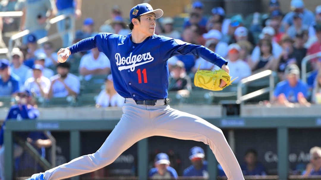 Feb 25, 2026; Salt River Pima-Maricopa, Arizona, USA; Los Angeles Dodgers pitcher Roki Sasaki (11) throws in the first inning against the Arizona Diamondbacks at Salt River Fields at Talking Stick. Mandatory Credit: Matt Kartozian-Imagn Images Feb 25, 2026; Salt River Pima-Maricopa, Arizona, USA; Los Angeles Dodgers pitcher Roki Sasaki (11) throws in the first inning against the Arizona Diamondbacks at Salt River Fields at Talking Stick. Mandatory Credit: Matt Kartozian-Imagn Images
