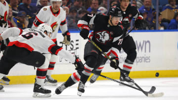 Jan 11, 2024; Buffalo, New York, USA;  Ottawa Senators defenseman Jakob Chychrun (6) knocks the puck