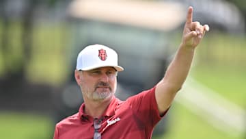 Colby Hale coaches from the sidelines in Arkansas' 8-0 win over Western Kentucky