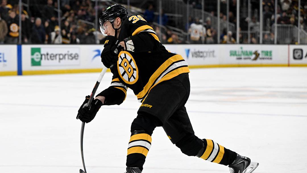 Dec 21, 2025; Boston, Massachusetts, USA; Boston Bruins center Morgan Geekie #39 takes a shot against the Ottawa Senators during the third period at the TD Garden. Mandatory Credit: Brian Fluharty-Imagn Images