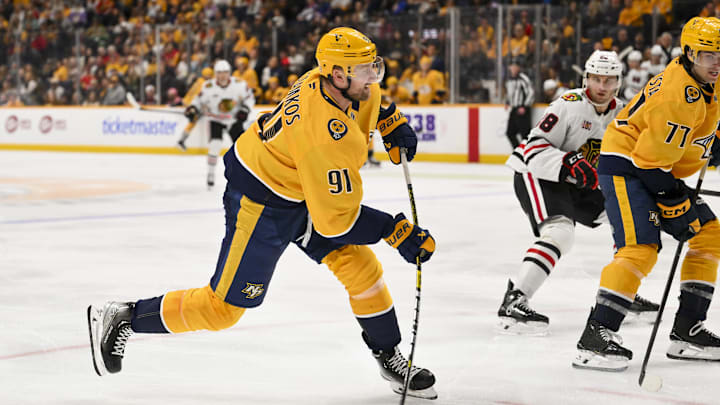 Feb 26, 2026; Nashville, Tennessee, USA;  Nashville Predators center Steven Stamkos (91) takes a shot on goal against the Chicago Blackhawks during the third period at Bridgestone Arena. Mandatory Credit: Steve Roberts-Imagn Images