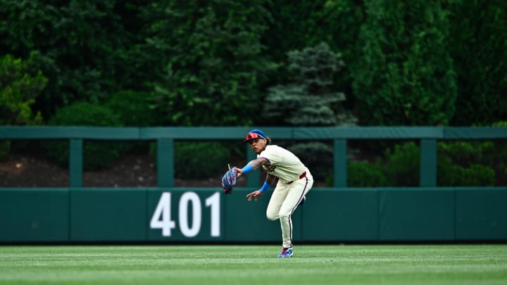 Jun 5, 2024; Philadelphia, Pennsylvania, USA; Philadelphia Phillies outfielder Cristian Pache (19) dives for a fly ball against the Milwaukee Brewers in the fourth inning at Citizens Bank Park.