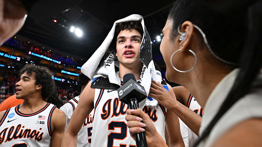 Mar 28, 2026; Houston, TX, USA; Illinois Fighting Illini guard Keaton Wagler (23) speaks to media after defeating the Iowa Hawkeyes in an Elite Eight game of the South Regional of the men's 2026 NCAA Tournament at Toyota Center. Mandatory Credit: Maria Lysaker-Imagn Images