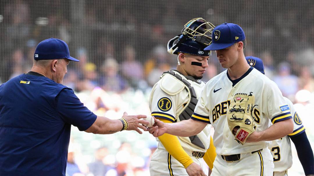 Jun 4, 2026; Milwaukee, Wisconsin, USA; Milwaukee Brewers starting pitcher Coleman Crow (57) hands the ball to manager Pat Murphy during a pitching change in the third inning against the San Francisco Giants at American Family Field. Mandatory Credit: Benny Sieu-Imagn Images Jun 4, 2026; Milwaukee, Wisconsin, USA; Milwaukee Brewers starting pitcher Coleman Crow (57) hands the ball to manager Pat Murphy during a pitching change in the third inning against the San Francisco Giants at American Family Field. Mandatory Credit: Benny Sieu-Imagn Images