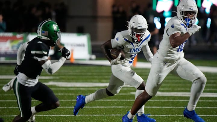 IMG running back Eric McFarland III (#3) follows his blocker tight end Judah Lancaster (#10) on his way to the end zone. The Venice Indians hosted the IMG Academy Ascenders National team Friday evening Sept. 3, 2025.