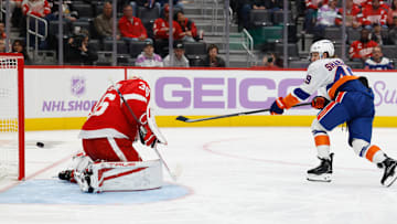 Nov 20, 2025; Detroit, Michigan, USA;  New York Islanders right wing Max Shabanov (49) shoots and scores on Detroit Red Wings goaltender John Gibson (36) in the third period at Little Caesars Arena. Mandatory Credit: Rick Osentoski-Imagn Images