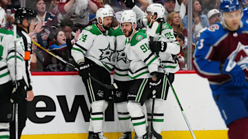 May 17, 2024; Denver, Colorado, USA; Dallas Stars left wing Jamie Benn (14) celebrates his goal scored with center Tyler Seguin (91) and defenseman Thomas Harley (55) and defenseman Miro Heiskanen (4) in the third period against the Colorado Avalanche in game six of the second round of the 2024 Stanley Cup Playoffs at Ball Arena. Mandatory Credit: Ron Chenoy-Imagn Images
