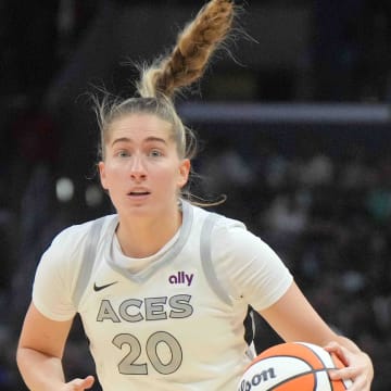 Jul 5, 2024; Los Angeles, California, USA; Las Vegas Aces guard Kate Martin (20) dribbles the ball against the LA Sparks in the second half at Crypto.com Arena. Mandatory Credit: Kirby Lee-USA TODAY Sports