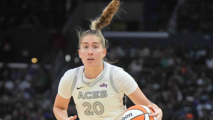 Jul 5, 2024; Los Angeles, California, USA; Las Vegas Aces guard Kate Martin (20) dribbles the ball against the LA Sparks in the second half at Crypto.com Arena. Mandatory Credit: Kirby Lee-USA TODAY Sports