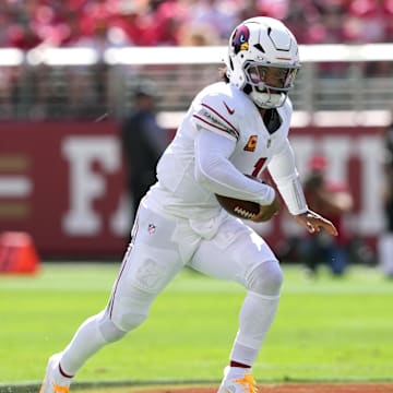 Oct 6, 2024; Santa Clara, California, USA; Arizona Cardinals quarterback Kyler Murray (1) rushes for a touchdown against the San Francisco 49ers during the first quarter at Levi's Stadium. Mandatory Credit: Darren Yamashita-Imagn Images